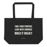 Black organic cotton tote bag with Build It Boldly message reading “Find Your Purpose, Lead With Courage, Build It Boldly” on a plain background.