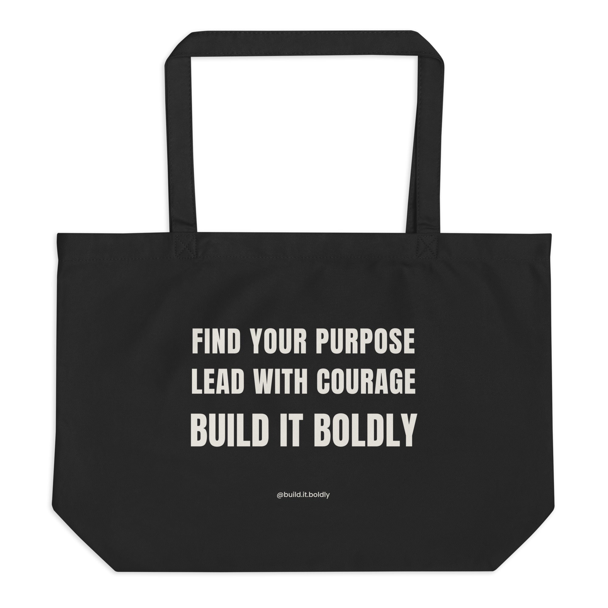 Black organic cotton tote bag with Build It Boldly message reading “Find Your Purpose, Lead With Courage, Build It Boldly” on a plain background.