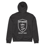 Back view of a dark heather gray Build It Boldly unisex organic hoodie with white “Optimism Protect Yours” shield graphic on a plain background.