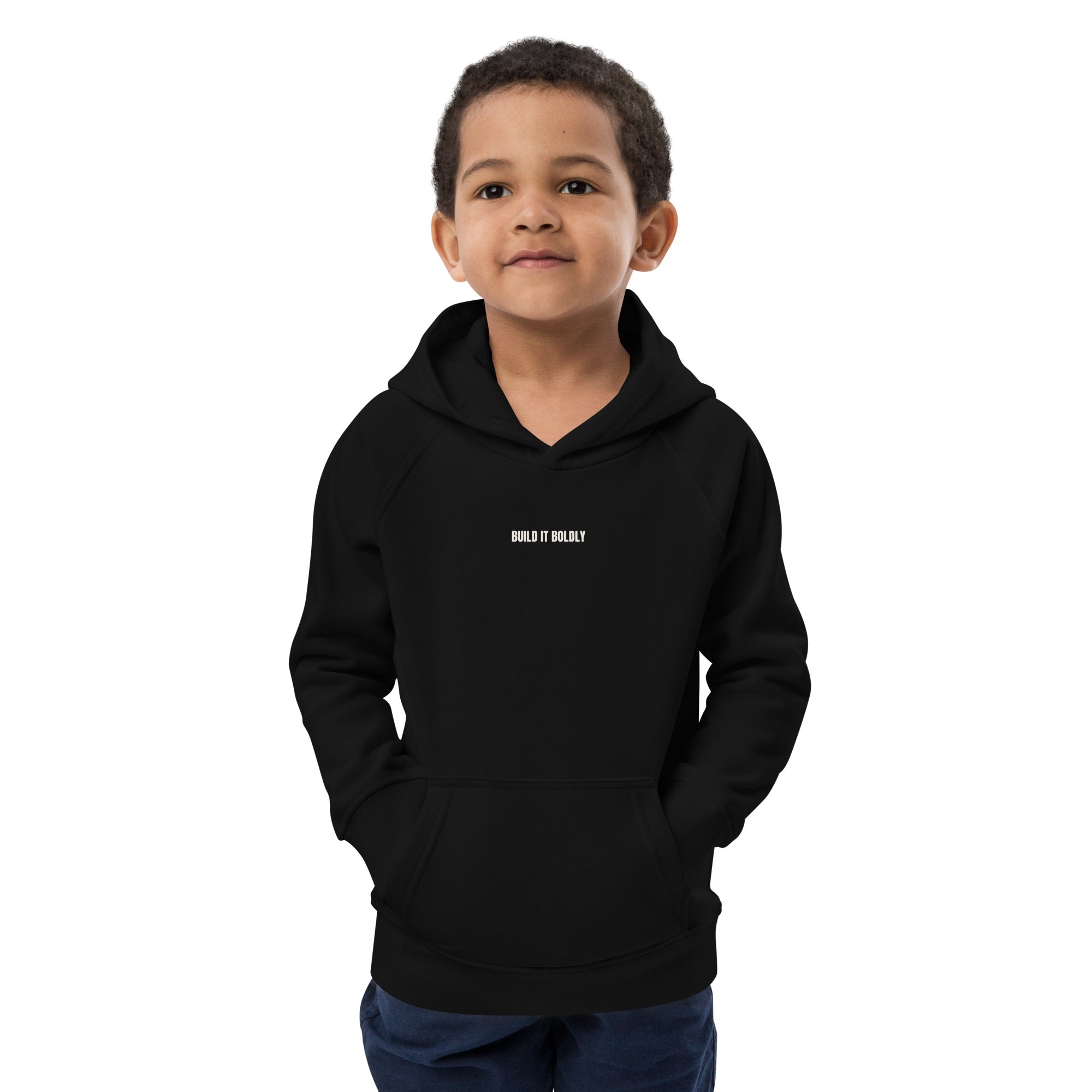 Front view of a child wearing a black Build It Boldly kids hoodie with small white chest logo.