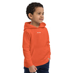 Child wearing a burnt orange Build It Boldly kids hoodie with small white chest logo, shown in right side view.