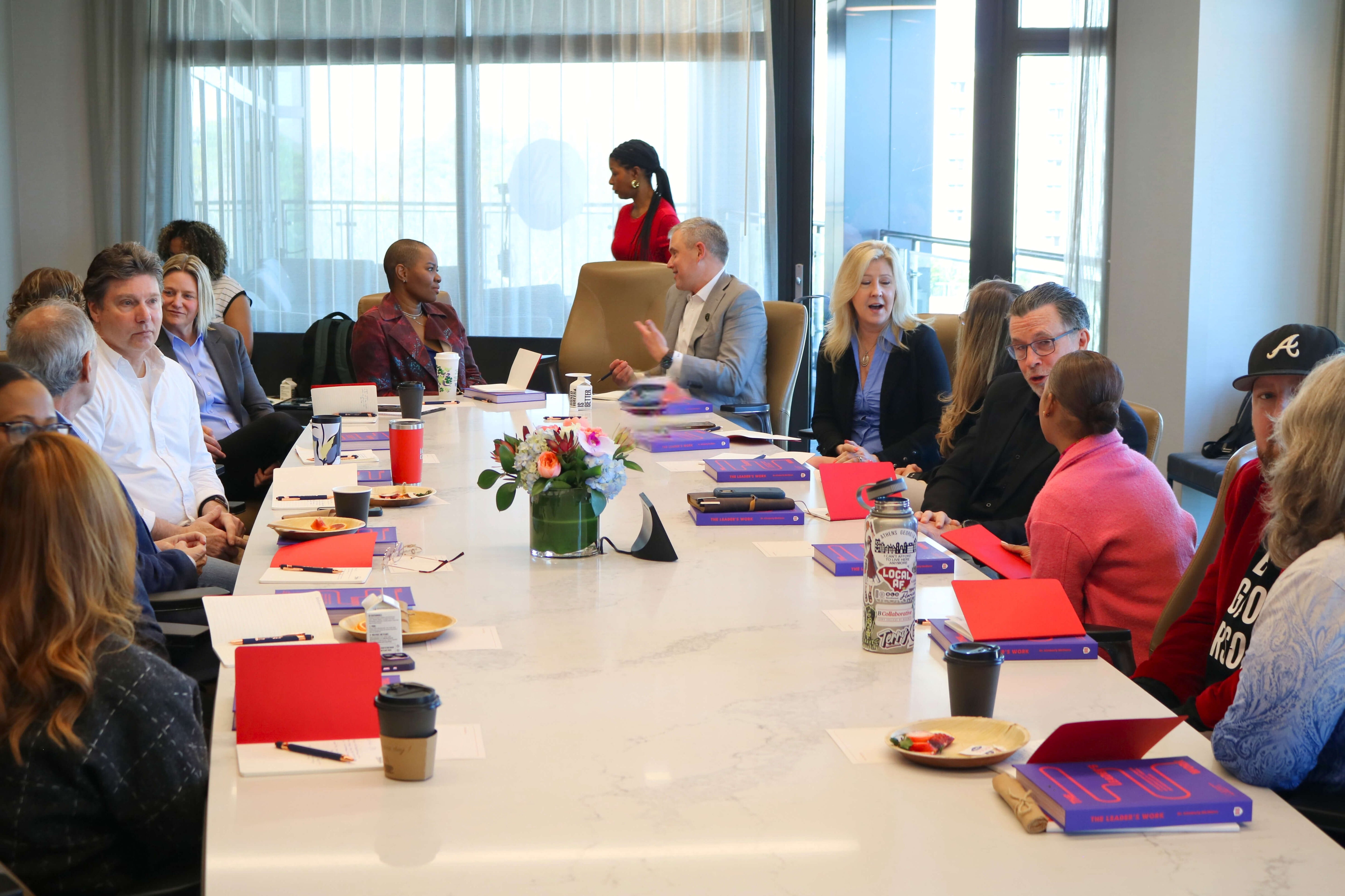 Participants engaged in dialogue during a Build It Boldly leadership workshop focused on reflection and discussion.