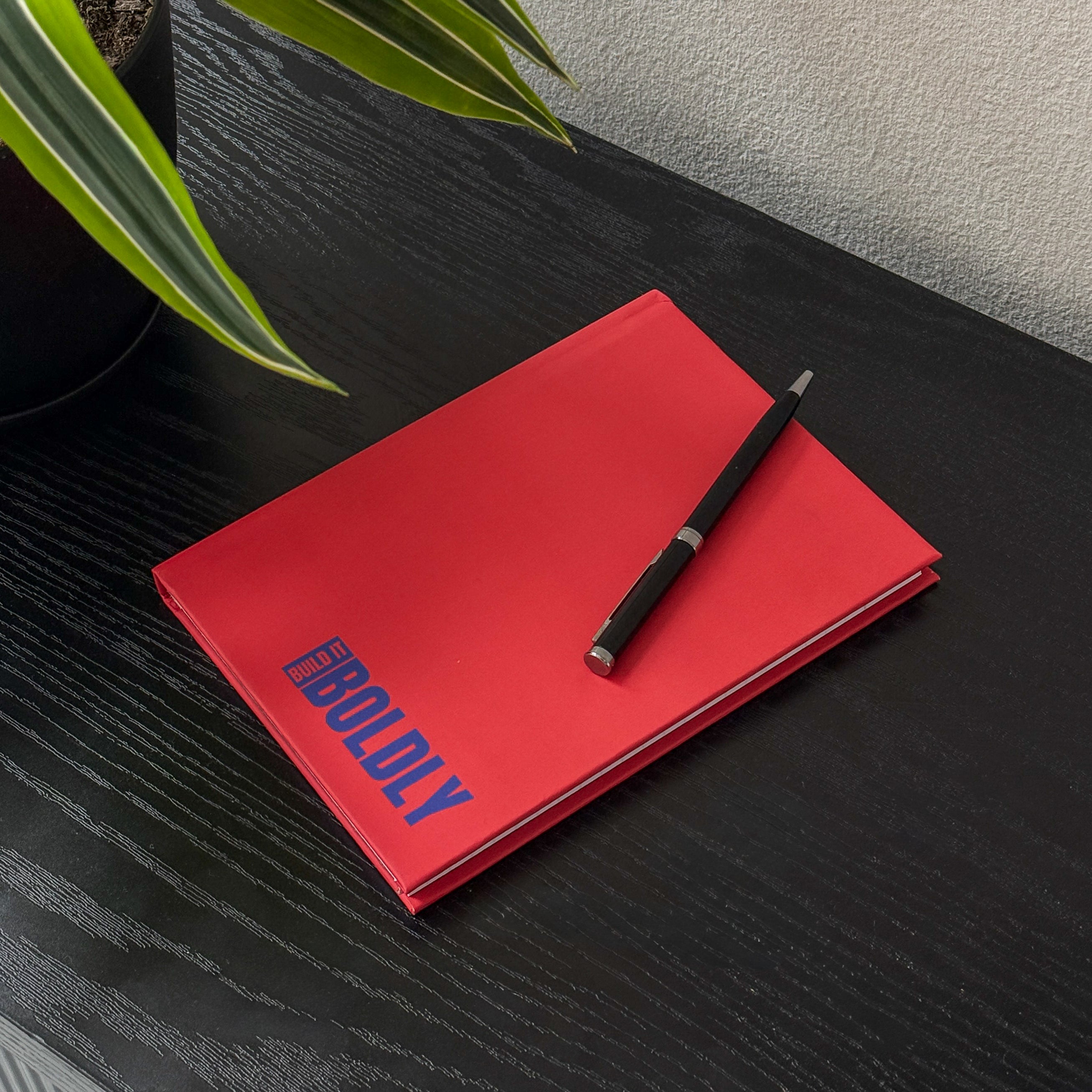 Build It Boldly Inner Audit leadership reflection journal on desk with pen, used for intentional leadership journaling.