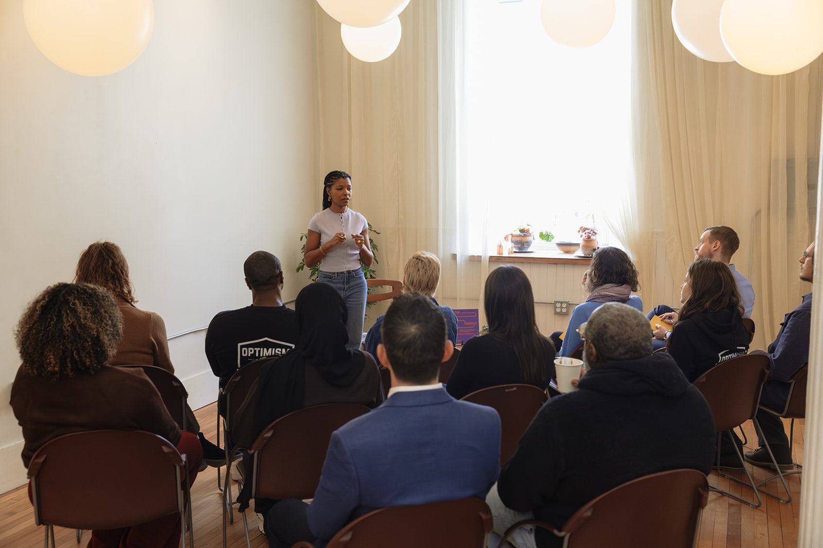 Audience seated during a Build It Boldly leadership workshop as Dr. Kimberly McGlonn speaks about intentional leadership practices.