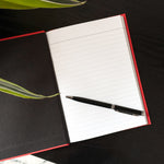 Open Build It Boldly Inner Audit Journal with lined pages and pen designed for leadership reflection and intentional practice.