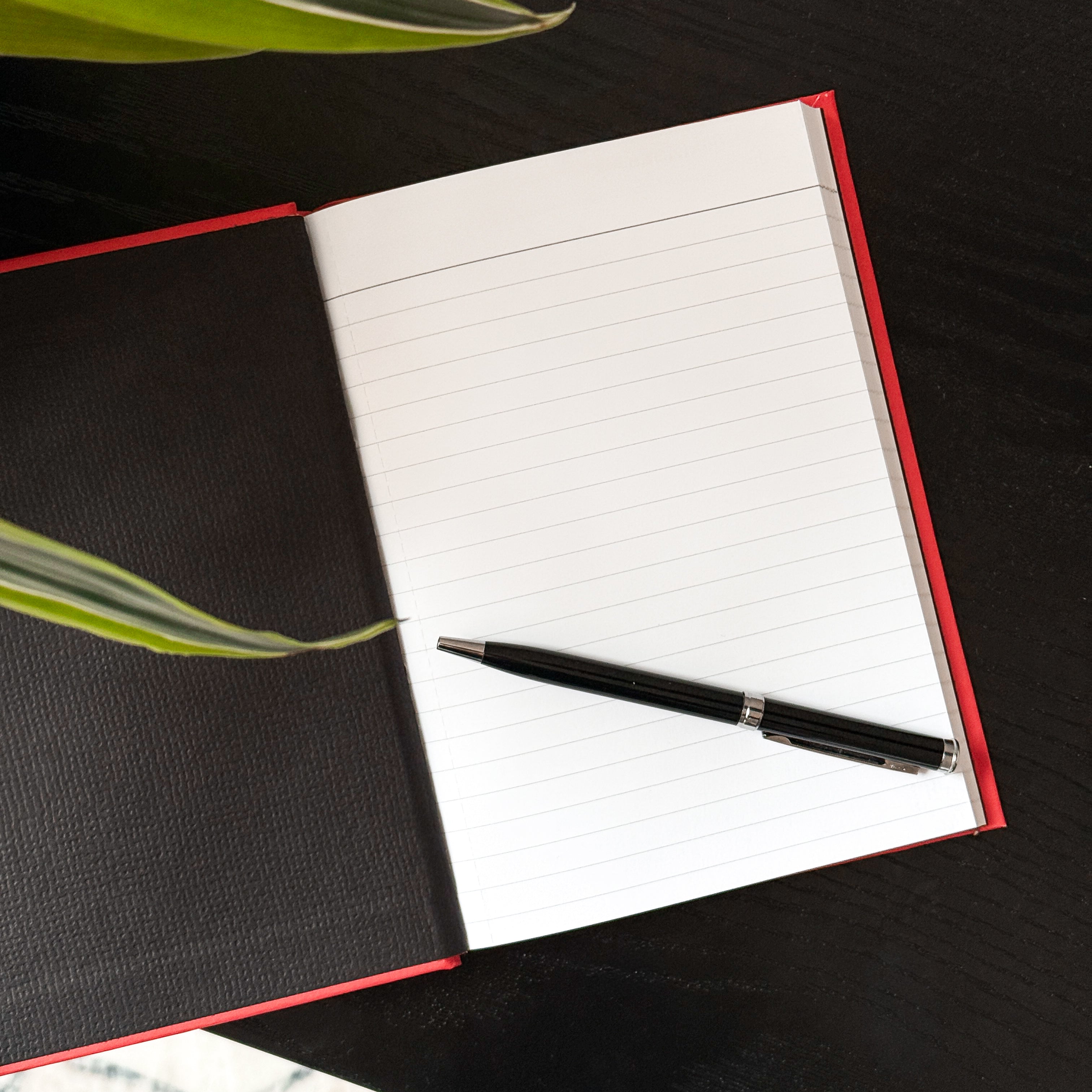 Open Build It Boldly Inner Audit Journal with lined pages and pen designed for leadership reflection and intentional practice.