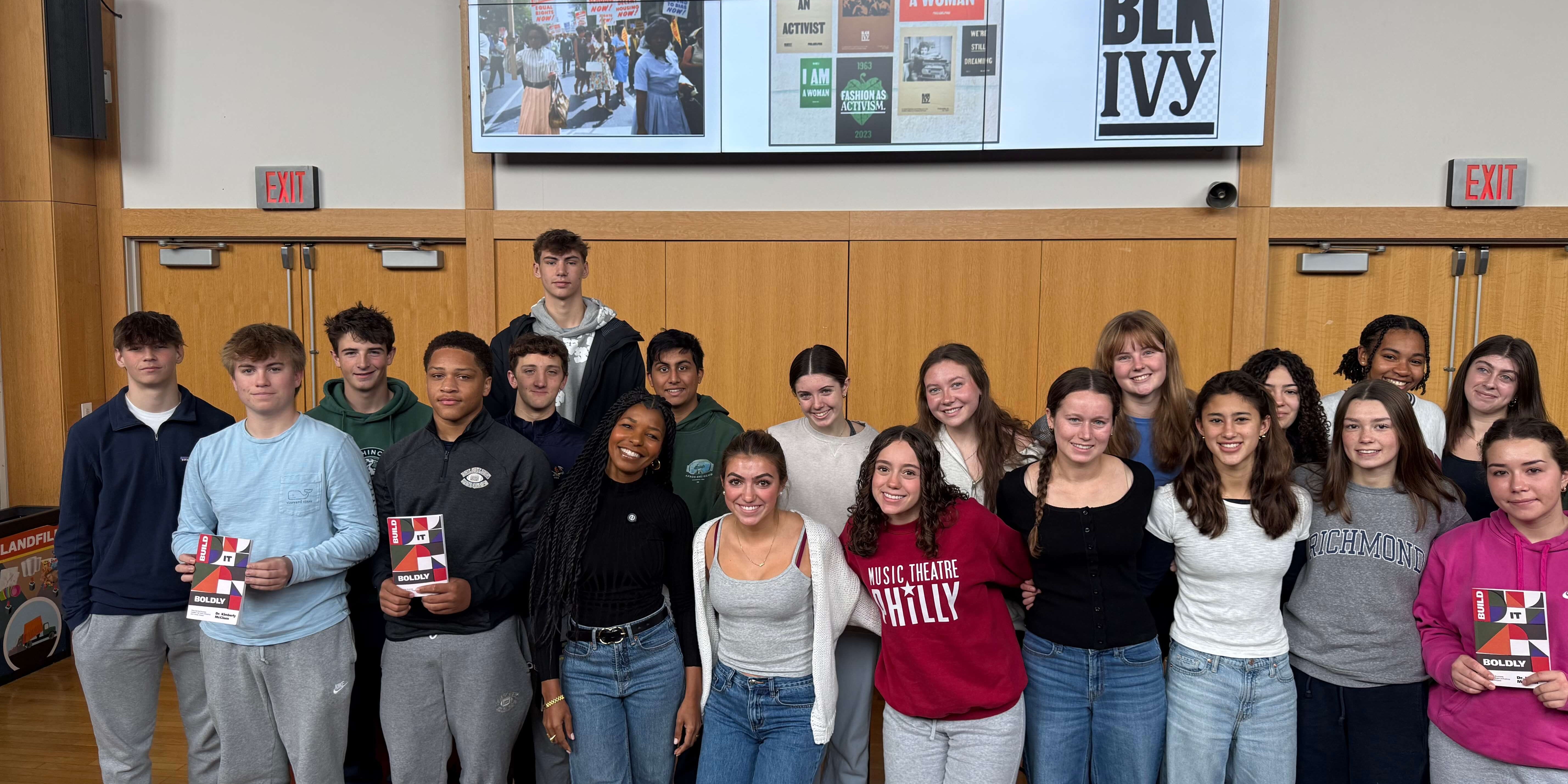 Students gathered with a Build It Boldly facilitator after a leadership workshop focused on courage and purpose.