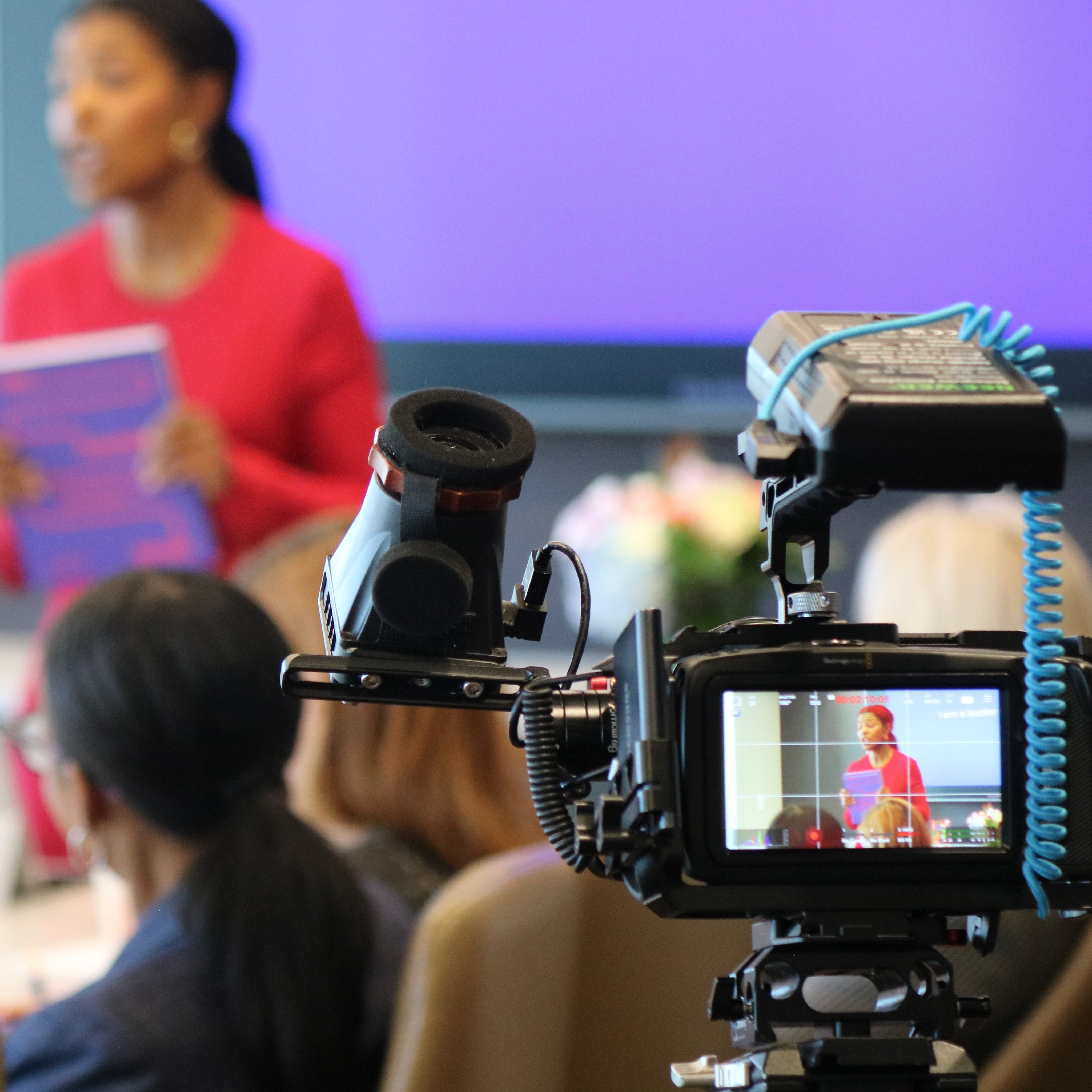 Video camera recording Dr. Kimberly McGlonn speaking during a Leader's Work leadership workshop